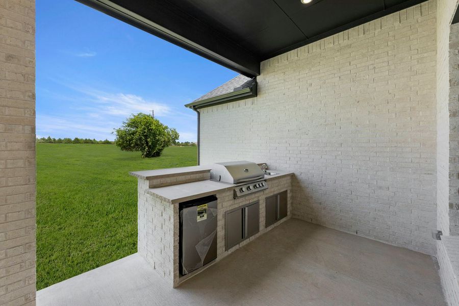 Exterior details and patio area of a home in Heritage, McLendon-Chisholm (Image 3). Exterior details and patio area of a home in Heritage, McLendon-Chisholm (Image 3).