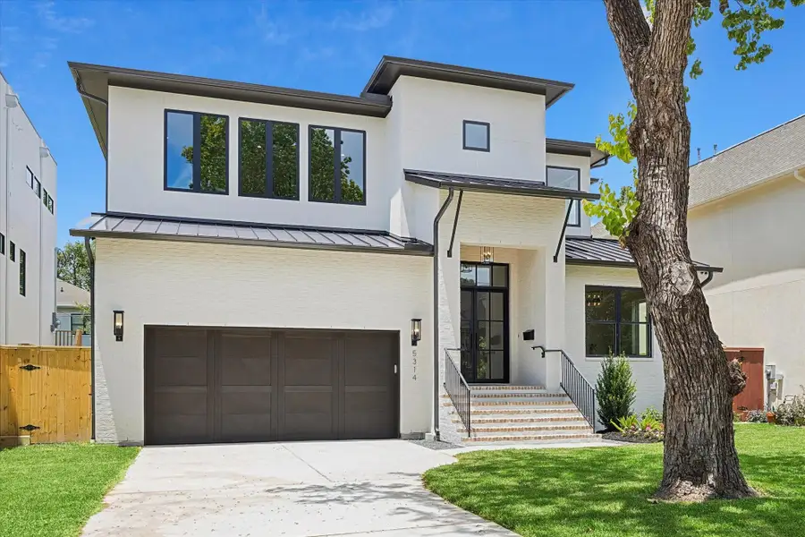 5314 Evergreen's white brick and stucco exterior, broad front steps, and timeless Bellaire presence await. 5314 Evergreen's white brick and stucco exterior, broad front steps, and timeless Bellaire presence await.