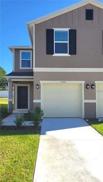 Front exterior of a new home in , Davenport, FL, highlighting curb appeal (Image 11). Front exterior of a new home in , Davenport, FL, highlighting curb appeal (Image 11).