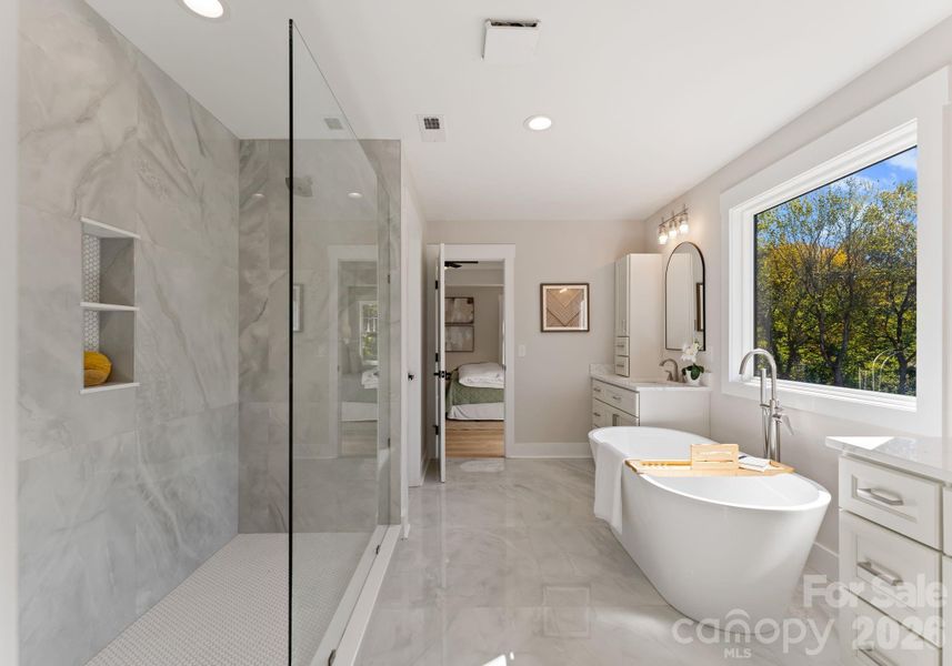 Primary Bathroom with Soaking Tub and Large Tiled Shower