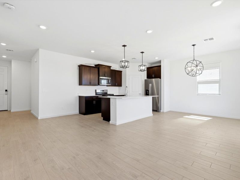 Furnished interior view inside a new home in Silva Farms - Classic Series, Goodyear (Image 6).