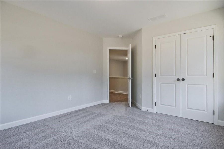 Spacious, unfurnished interior of a new home in Cherokee Township, Acworth (Image 33).