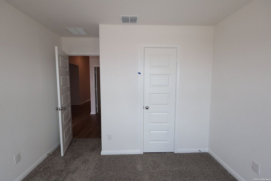 Spacious, unfurnished interior of a new home in Verano Farms, San Antonio (Image 20).