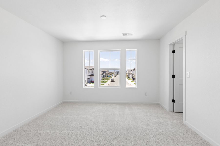 Representative unfurnished interior of a home built from the Bloom Series - Violet by Brightland Homes in Granary, Johnstown (Image 14). Representative unfurnished interior of a home built from the Bloom Series - Violet by Brightland Homes in Granary, Johnstown (Image 14).