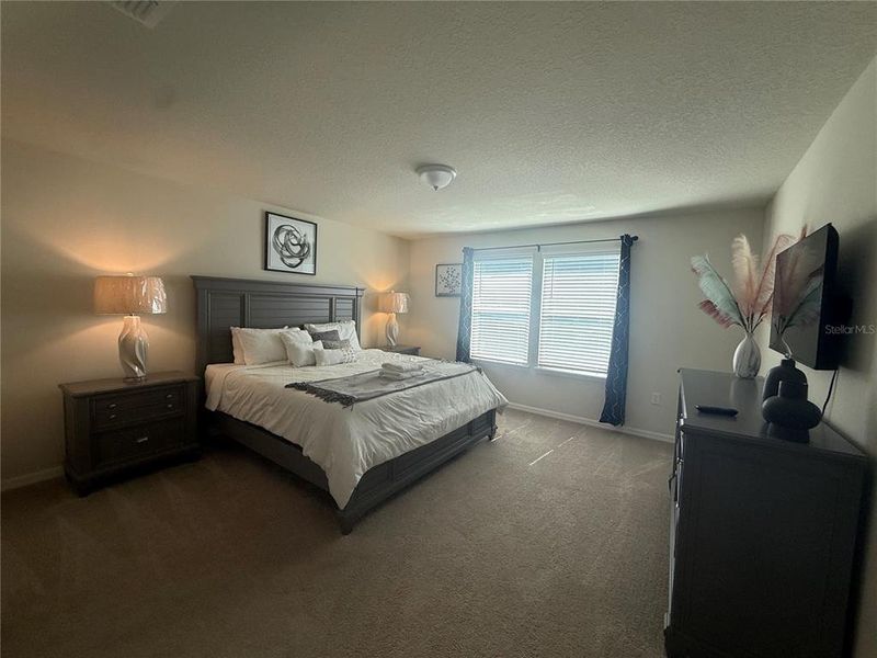 Furnished interior view inside a new home in Windsor Cay Resort, Clermont (Image 12).
