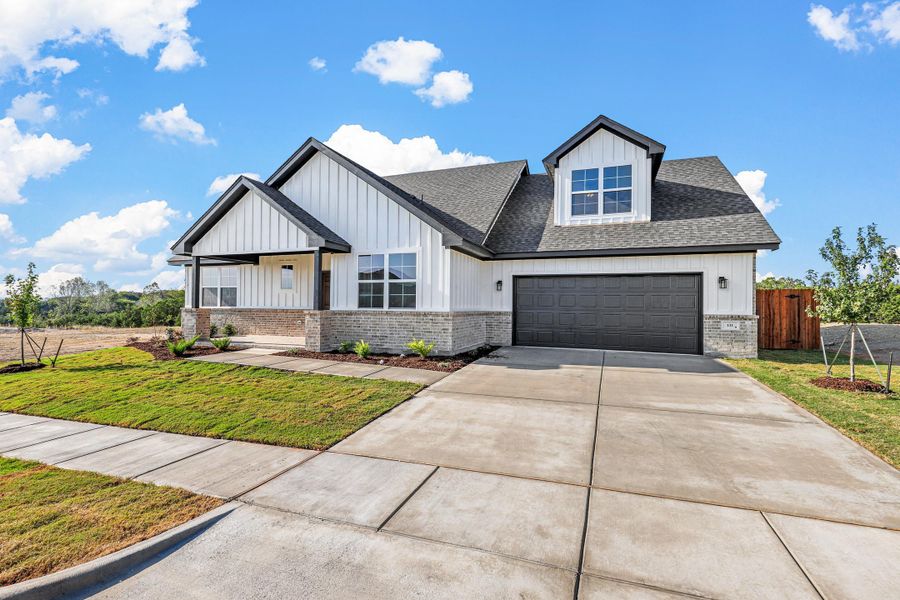 Representative exterior photo of a completed home built from the Garrison II by Cheldan Homes in Stoneview, Glen Rose, TX (Image 28).
