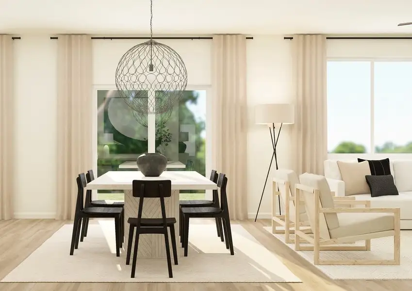 Rendering of a  dining room showing a large white table surrounded by six black chairs. The  kitchen and living room can be seen on either side of the table.