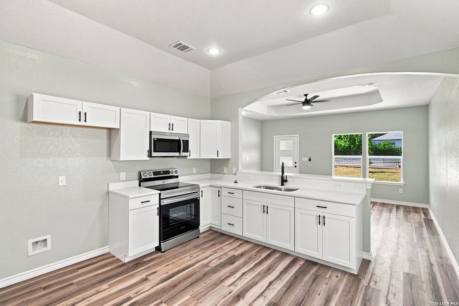 Furnished interior view inside a new home in , San Antonio (Image 8).