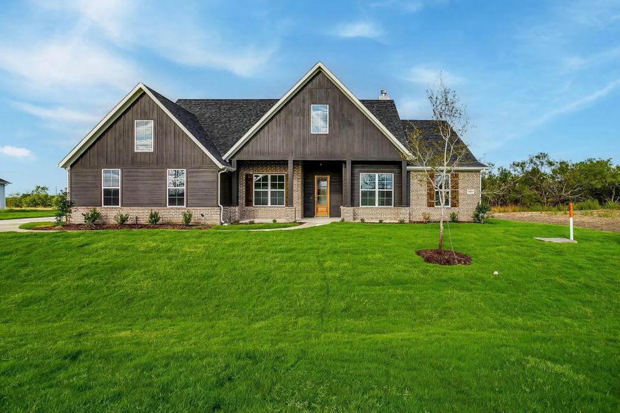 Representative exterior photo of a completed home built from the The Finley by Elmwood Custom Homes in Matthews Farm, Venus, TX (Image 7). Representative exterior photo of a completed home built from the The Finley by Elmwood Custom Homes in Matthews Farm, Venus, TX (Image 7).