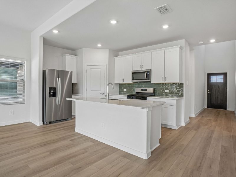 Furnished interior view inside a new home in Parks at Foster Crossing - Signature Series, Anna (Image 5).