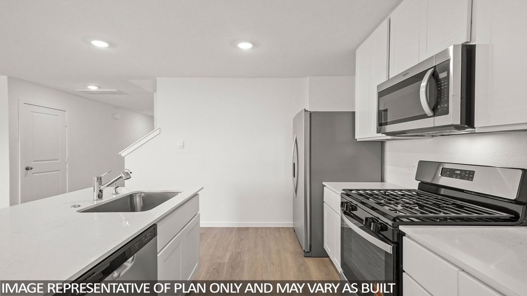 Furnished interior view inside a new home in Sunterra, Katy (Image 8).