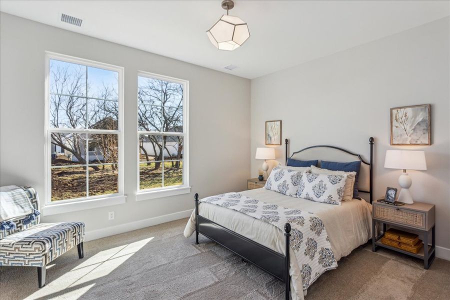 Representative furnished interior of a home built from the Bedford by Perfection Builders in The Courtyards at Cornerstone, Andover (Image 9).