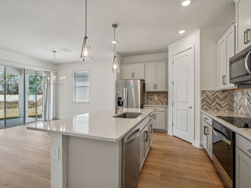 Furnished interior view inside a new home in Ridgehaven - Signature Series, Ormond Beach (Image 5).