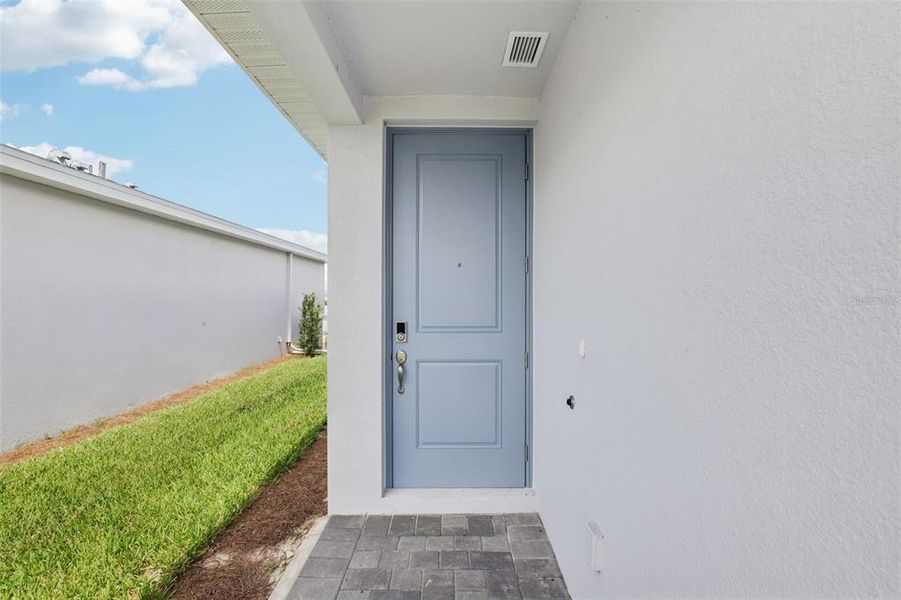 Exterior details and patio area of a home in Crescent Lakes - Premier Series, Punta Gorda (Image 18).