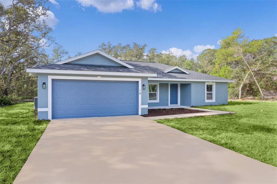 Front exterior of a new home in , Ocklawaha, FL, highlighting curb appeal (Image 2).