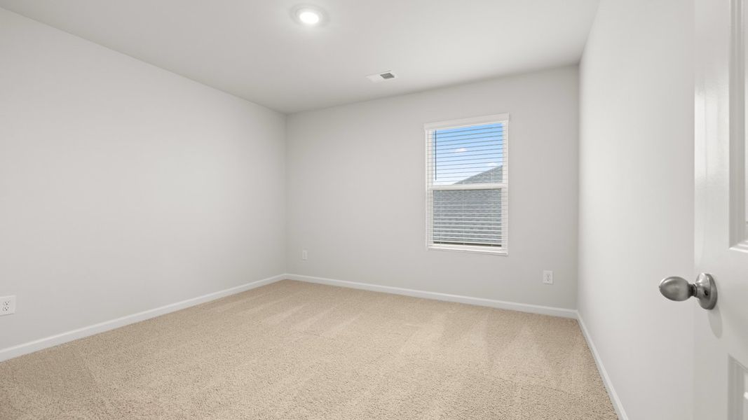 Representative unfurnished interior of a home built from the Halton by D.R. Horton in Highland Hills, Graniteville (Image 24).