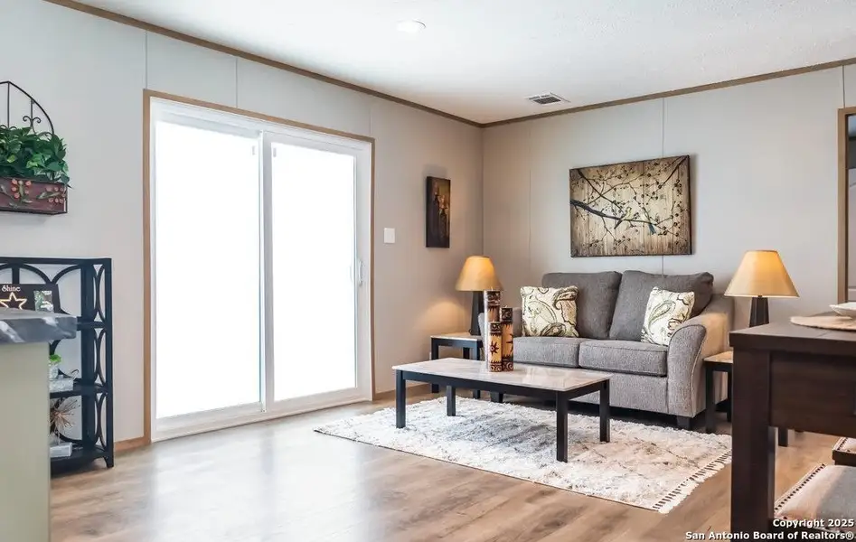 Furnished interior view inside a new home in , Elmendorf (Image 3).