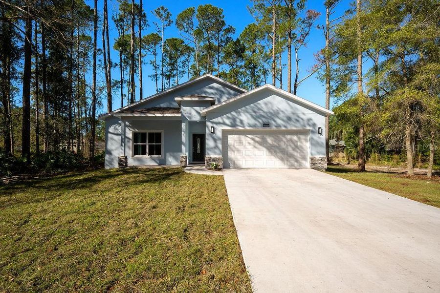 Front exterior of a new home in , Deland, FL, highlighting curb appeal (Image 22).