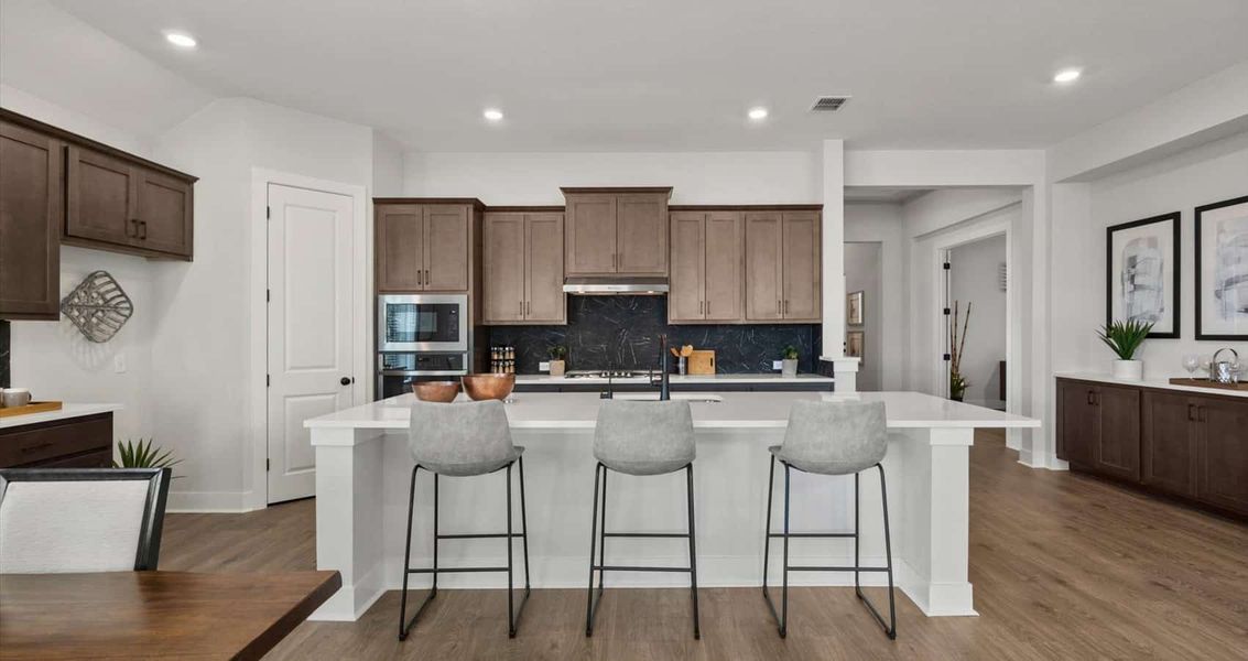 Representative furnished interior of a home built from the Mia by Chesmar Homes in Sunfield, Buda (Image 5).