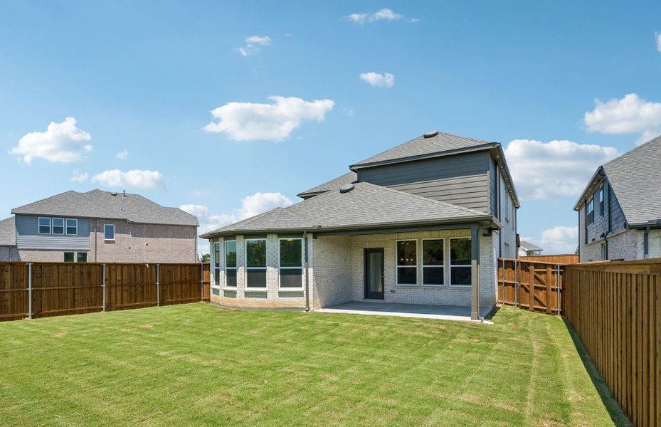 Exterior details and patio area of a home in Highland Lakes, McKinney (Image 3).