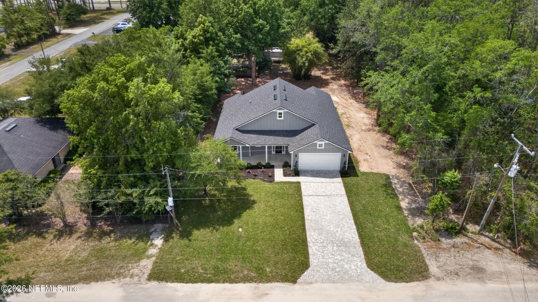 Front exterior of a new home in , Macclenny, FL, highlighting curb appeal (Image 25).