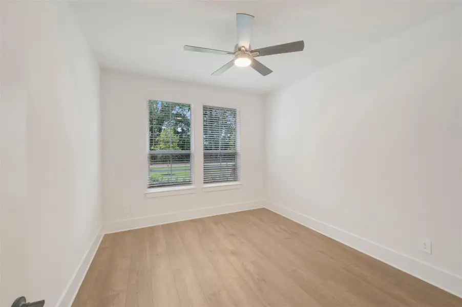 Spacious, unfurnished interior of a new home in The Oaks on 6th Street, Magnolia (Image 21).