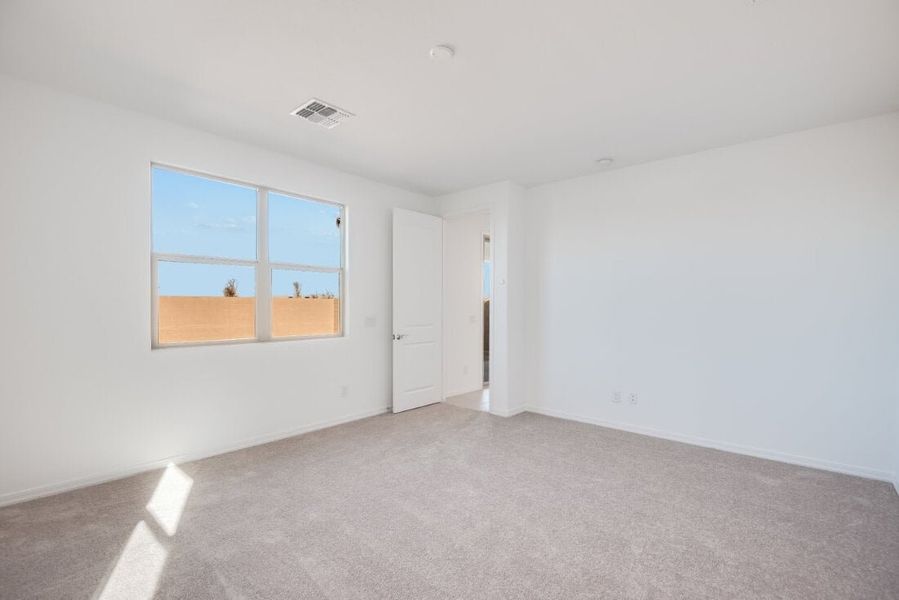 Spacious, unfurnished interior of a new home in Artisan at Asante, Surprise (Image 12).