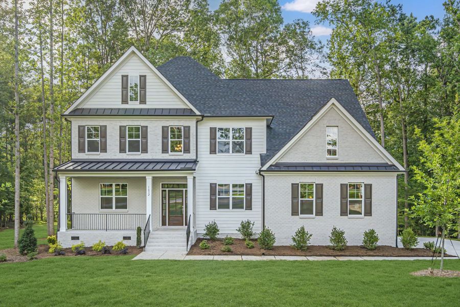 Representative exterior photo of a completed home built from the Dawson by HHHunt Homes LLC in The Summit at Morgan Ridge, Chapel Hill, NC (Image 1). Representative exterior photo of a completed home built from the Dawson by HHHunt Homes LLC in The Summit at Morgan Ridge, Chapel Hill, NC (Image 1).