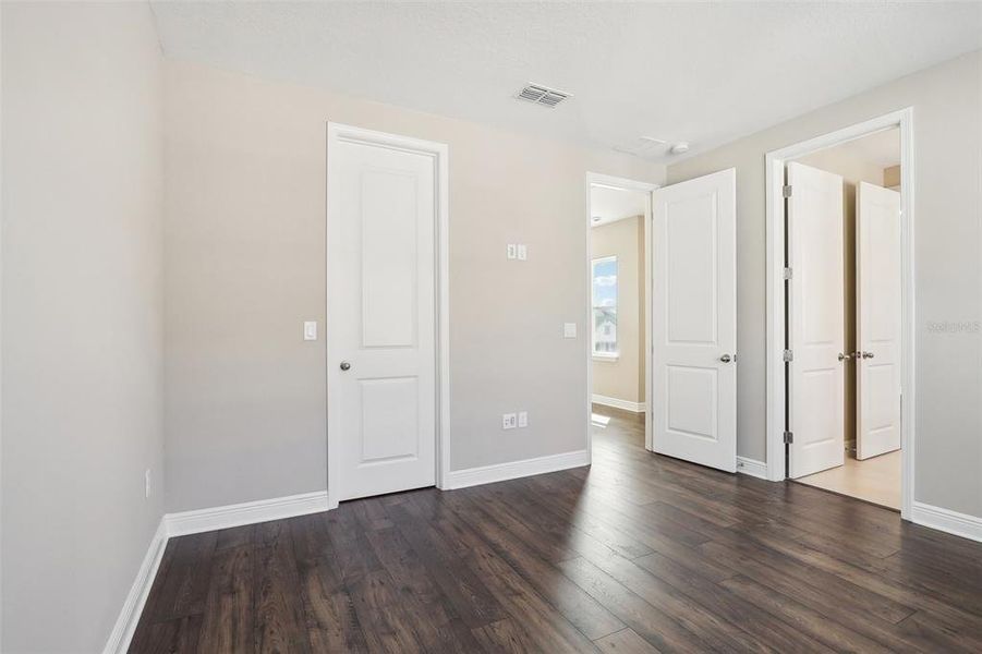 Spacious, unfurnished interior of a new home in Laureate Park, Orlando (Image 36).
