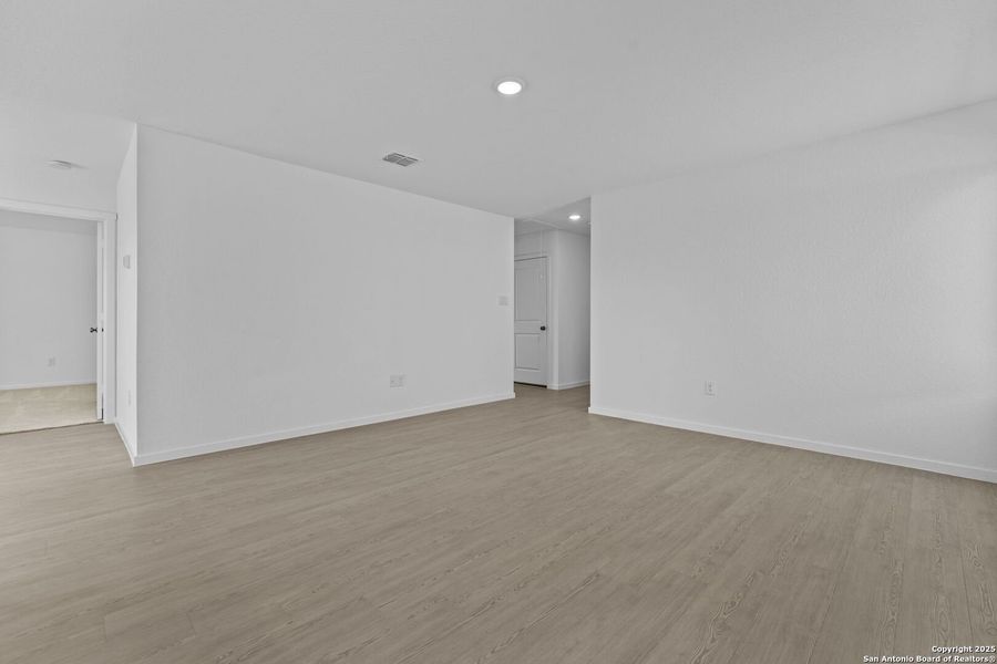 Spacious, unfurnished interior of a new home in Torian Village: Watermill Collection, San Antonio (Image 19).