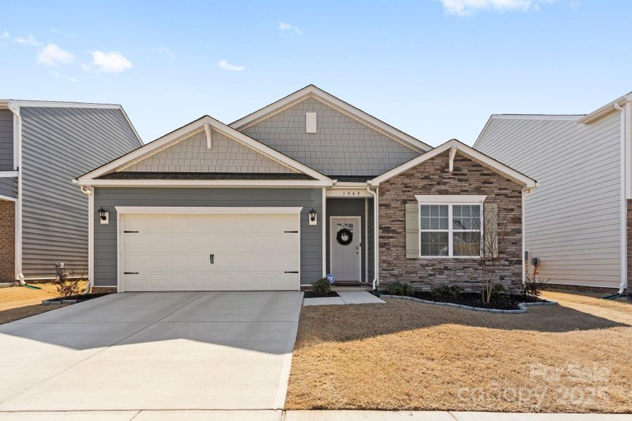 Front exterior of a new home in Secrest Commons, Monroe, NC, highlighting curb appeal (Image 21).