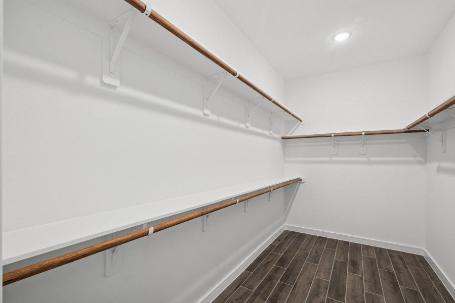 Primary walk-in closet (*Photo not of actual home and used for illustration purposes only.) Primary walk-in closet (*Photo not of actual home and used for illustration purposes only.)