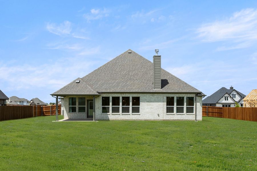 Exterior details and patio area of a home in Coyote Crossing, Godley (Image 4). Exterior details and patio area of a home in Coyote Crossing, Godley (Image 4).