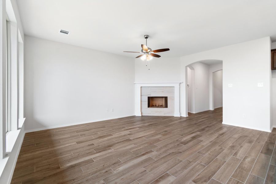 Family Room | Concept 1660 at Hunters Ridge in Crowley, TX by Landsea Homes