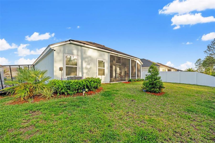 Front exterior of a new home in Sawmill Branch, Palm Coast, FL, highlighting curb appeal (Image 21).