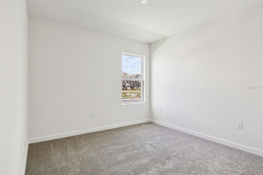 Spacious, unfurnished interior of a new home in Willowbrook North, Winter Haven (Image 22).