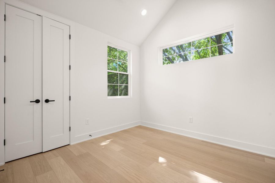 Hardwood floors and bright windows create an inviting, open atmosphere. Hardwood floors and bright windows create an inviting, open atmosphere.