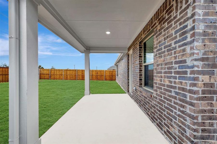 Exterior details and patio area of a home in Sagebrook, Argyle (Image 21). Exterior details and patio area of a home in Sagebrook, Argyle (Image 21).
