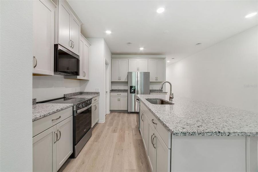 Furnished interior view inside a new home in Towns at Greenleaf, Oviedo (Image 8).