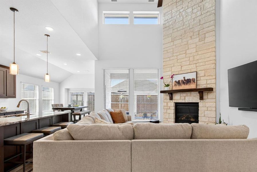 The gas fireplace is incredible. Stone all the way to the ceiling, and the perfect wood mantel. The gas fireplace is incredible. Stone all the way to the ceiling, and the perfect wood mantel.