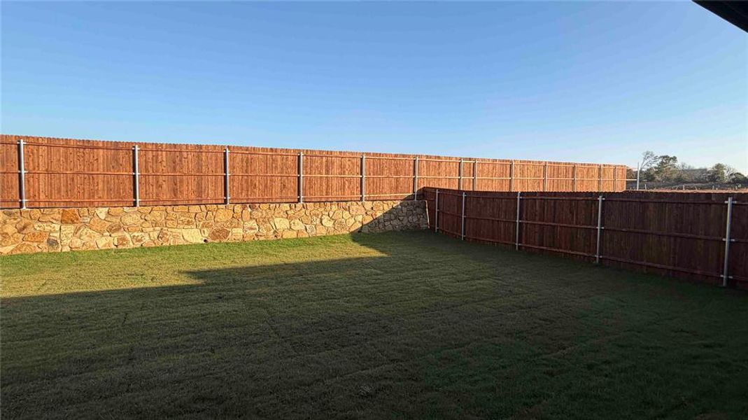 Exterior details and patio area of a home in Blaire Lake, Tyler (Image 14). Exterior details and patio area of a home in Blaire Lake, Tyler (Image 14).