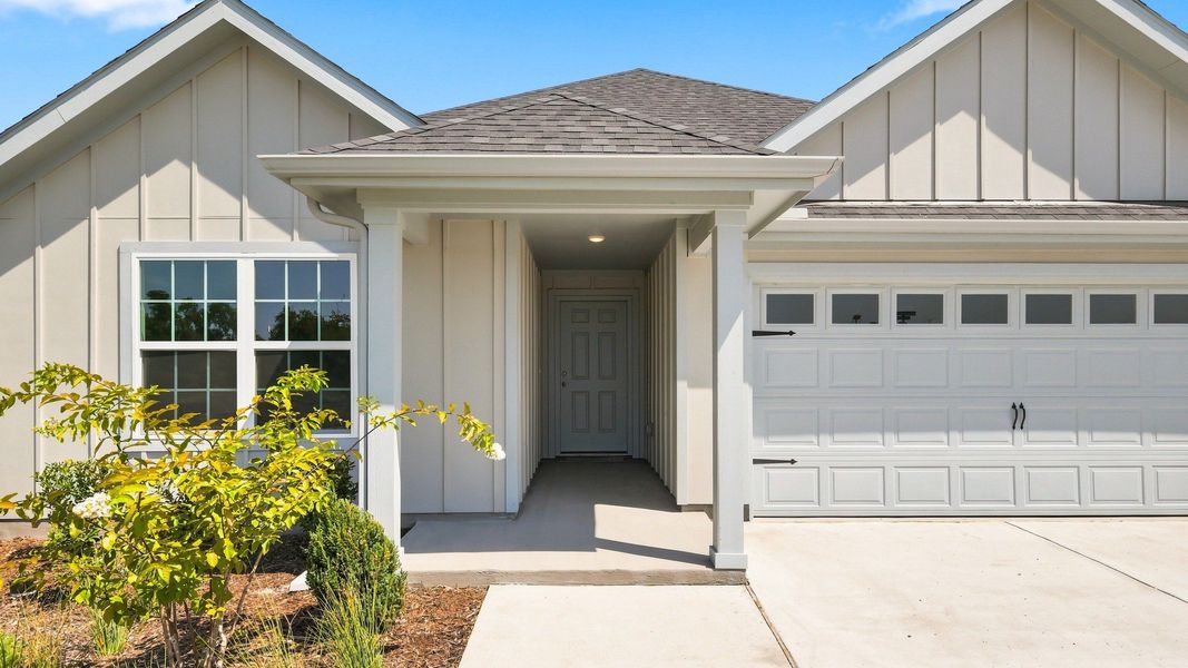 Front exterior of a new home in Morningside, Farmersville, TX, highlighting curb appeal (Image 24).