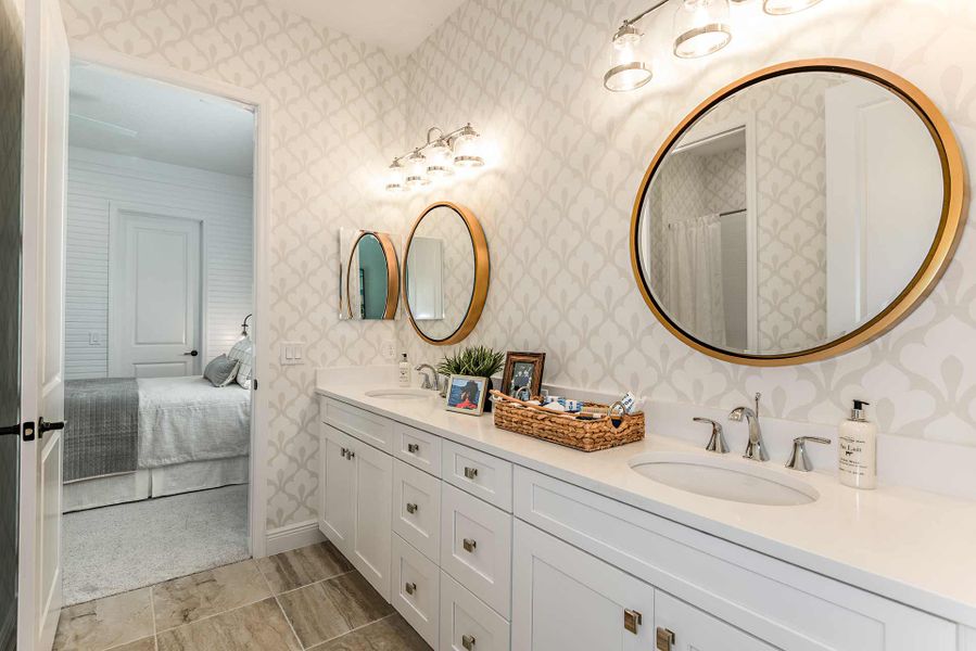 Representative furnished interior of a home built from the Kiawah 2 by Neal Communities in SkySail, Naples (Image 9).