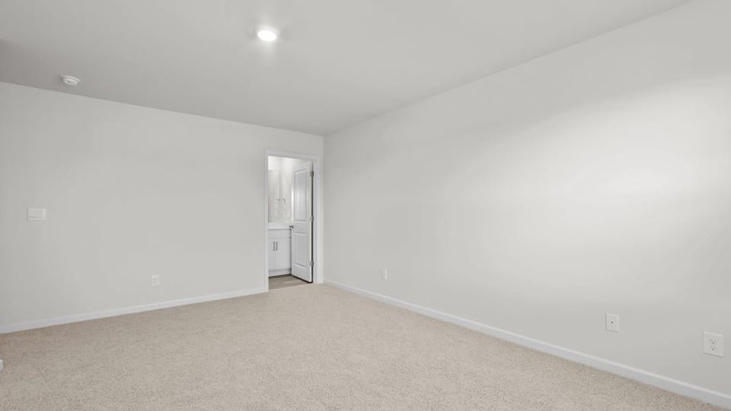 Spacious, unfurnished interior of a new home in The Townes at Ridgewood Farms, Winterville (Image 27).