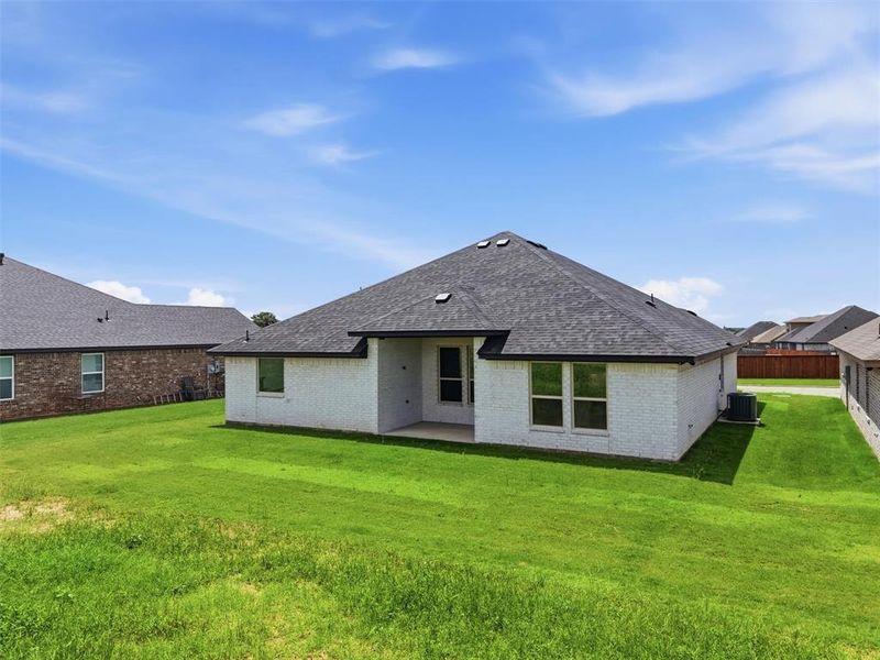Exterior details and patio area of a home in , Tolar (Image 24).