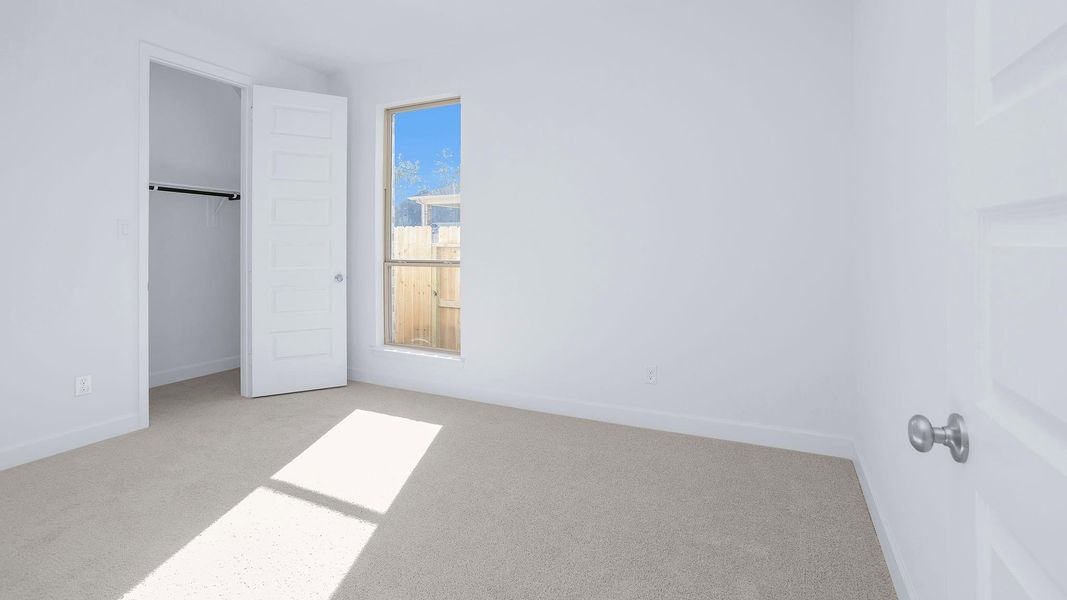 Spacious, unfurnished interior of a new home in Artavia 45', Conroe (Image 16).