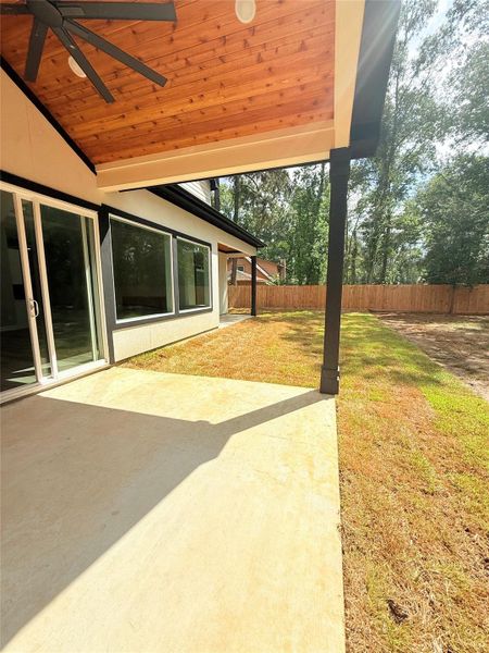 Exterior details and patio area of a home in , New Caney (Image 18).