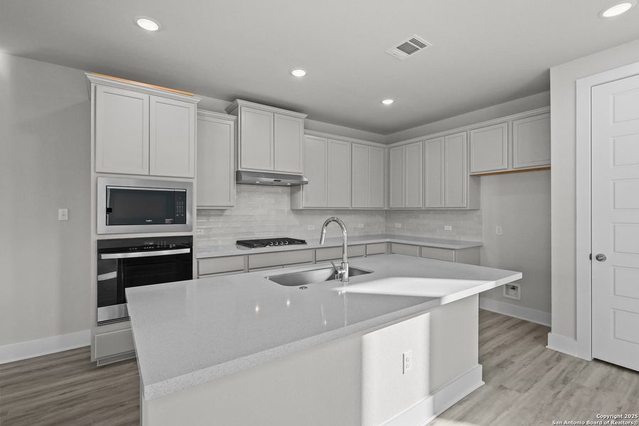 Furnished interior view inside a new home in Veramendi, New Braunfels (Image 11).