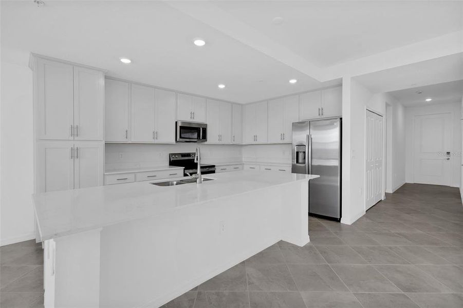 Furnished interior view inside a new home in Wellen Park Golf & Country Club, Venice (Image 6).