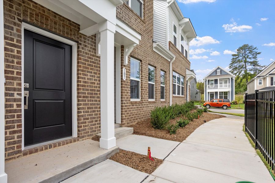 Exterior details and patio area of a home in Renaissance at White Oak, Garner (Image 3).